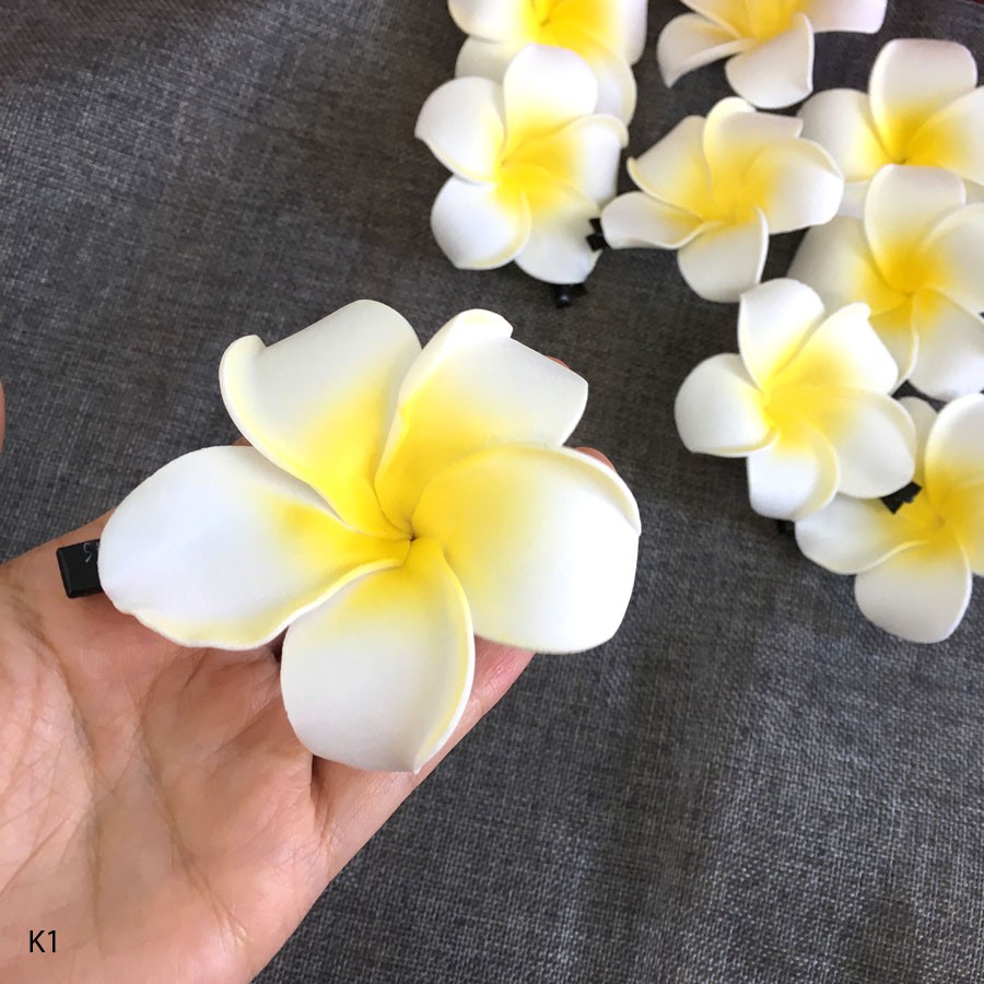 Kẹp tóc hoa sứ đi biển K1