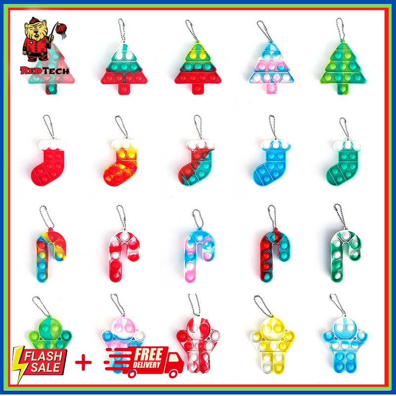 Đồ chơi pop it giá rẻ phiên bản móc khóa giáng sinh, đồ chơi xả stress.