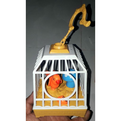 Một chiếc lồng chim Vuông mini bằng nhựa có nhạc và đèn rất đẹp Tặng kèm pin