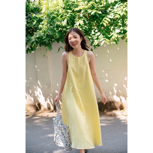 Đầm vàng sát nách Dottie size S