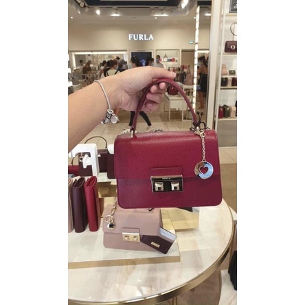 Miếng dán khoá túi Fl top b.e.l.l.a