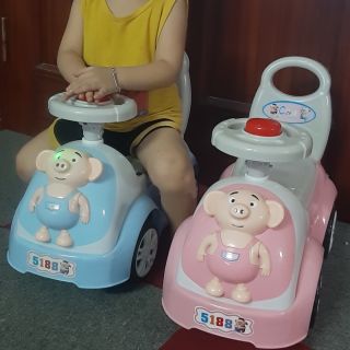Xe lắc chòi chân có đèn nhạc con heo xinh xắn