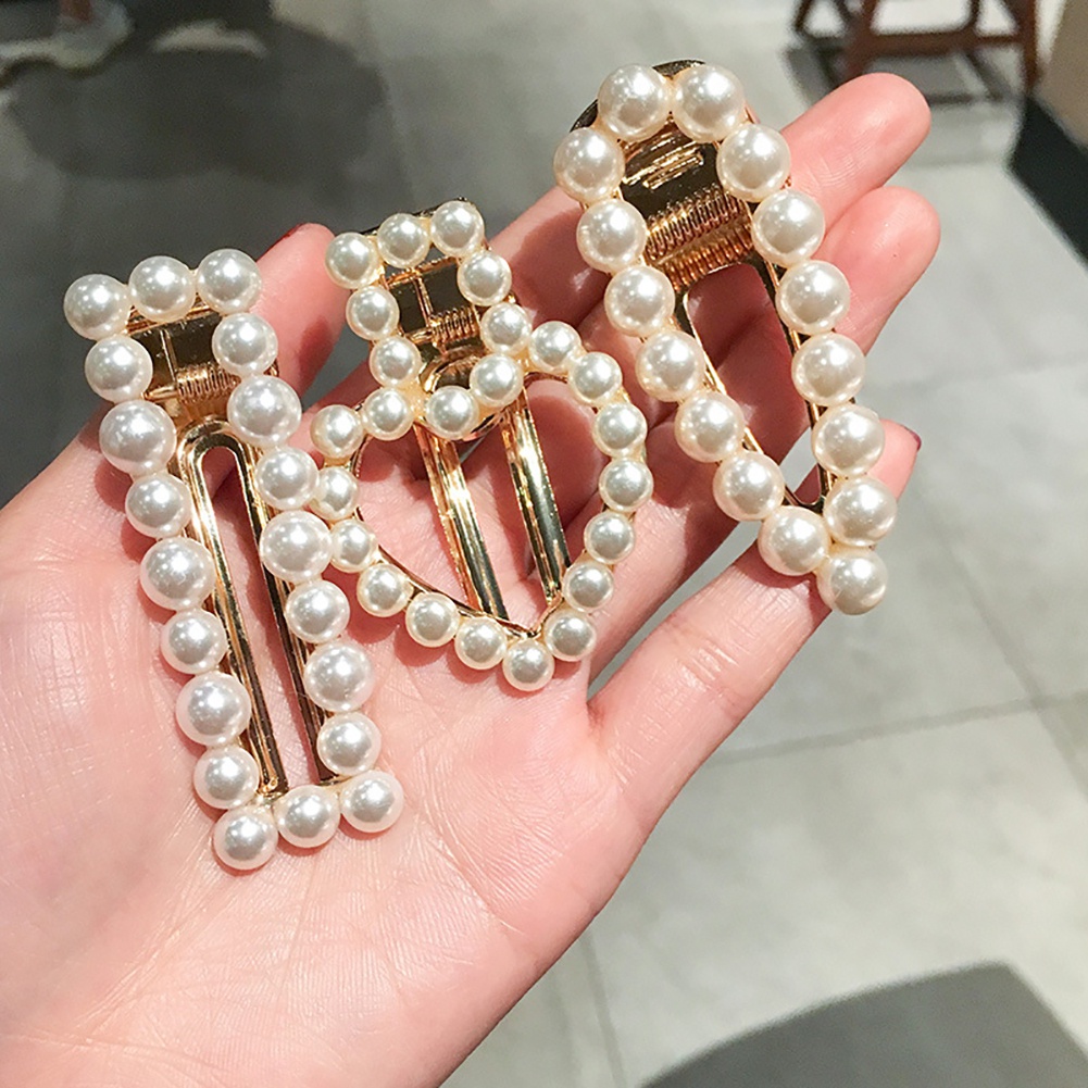 Kẹp tóc đính ngọc trai giả sang trọng