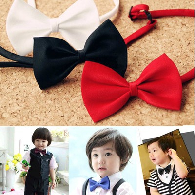 Nơ cài cổ áo màu trơn xinh xắn cho bé