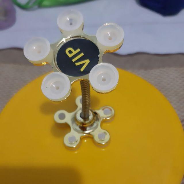 Giá đỡ điện thoại hút chân không nhỏ gọn hình bông hoa mai | BigBuy360 - bigbuy360.vn