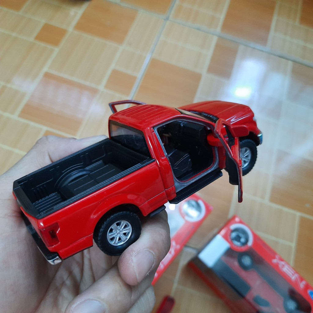 Xe ô tô mini đồ chơi trẻ em mô hình tỉ lệ 1:36 hãng welly mẫu xe Ford F-150 Regular Cab bằng kim loại mở được cửa xe