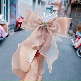 kẹp tóc nơ xinh xắn đính charm thương hiệu thời trang