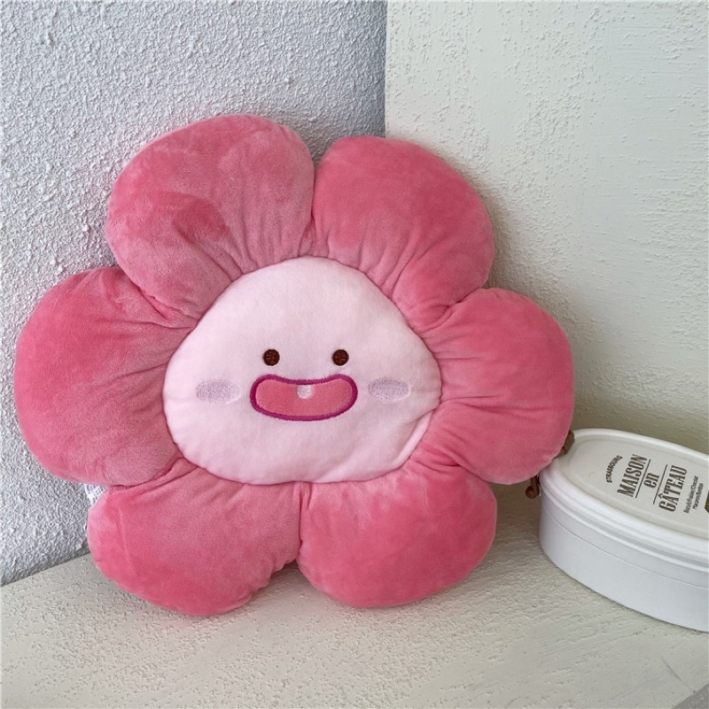 Gối bông hoa sún răng đáng yêu