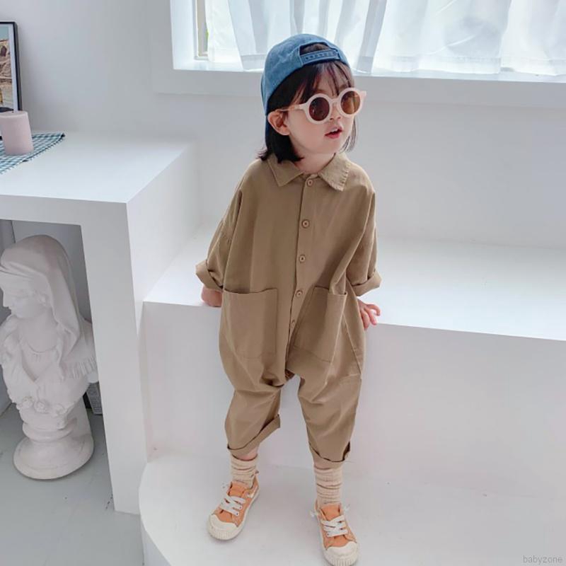 Áo liền quần dài tay đính nút thời trang cho bé