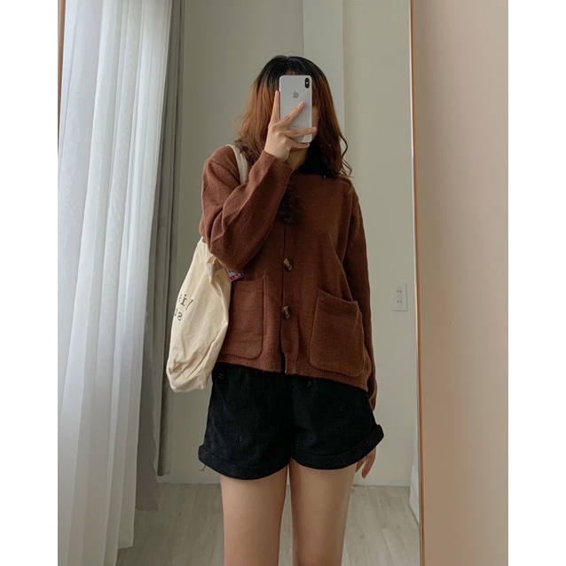 Áo len cổ pha màu túi trước