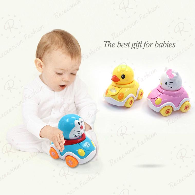 Xe đồ chơi lắc tạo hình Doraemon cho bé