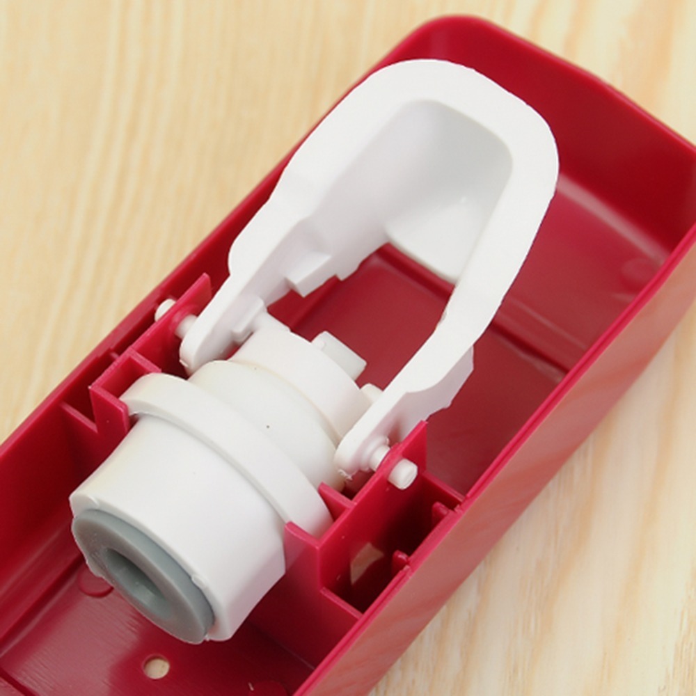 Dụng cụ lấy kem đánh răng tự động