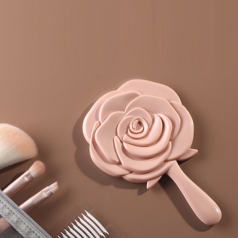 Gương cầm tay hình hoa hồng,,,