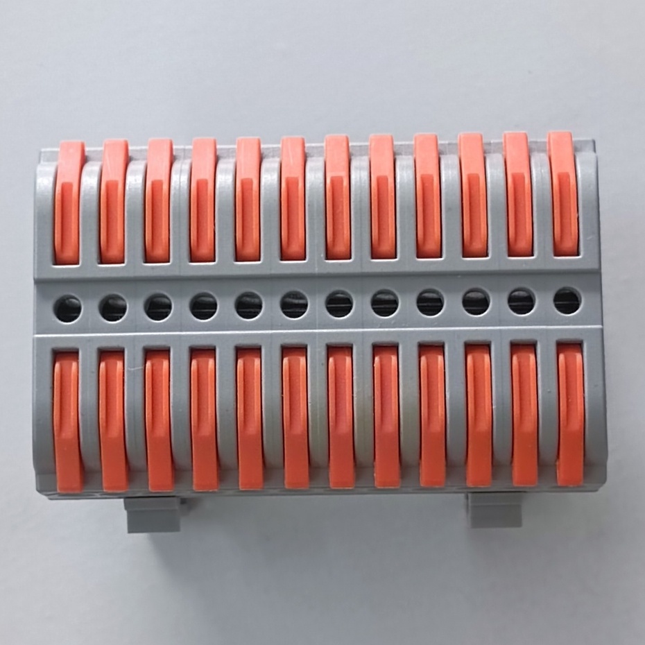 Cút Nối Dây Điện nhanh thông minh gắn trên ray 12P 12 cổng vào 12 cổng ra PCT-2212D màu xám chốt màu cam