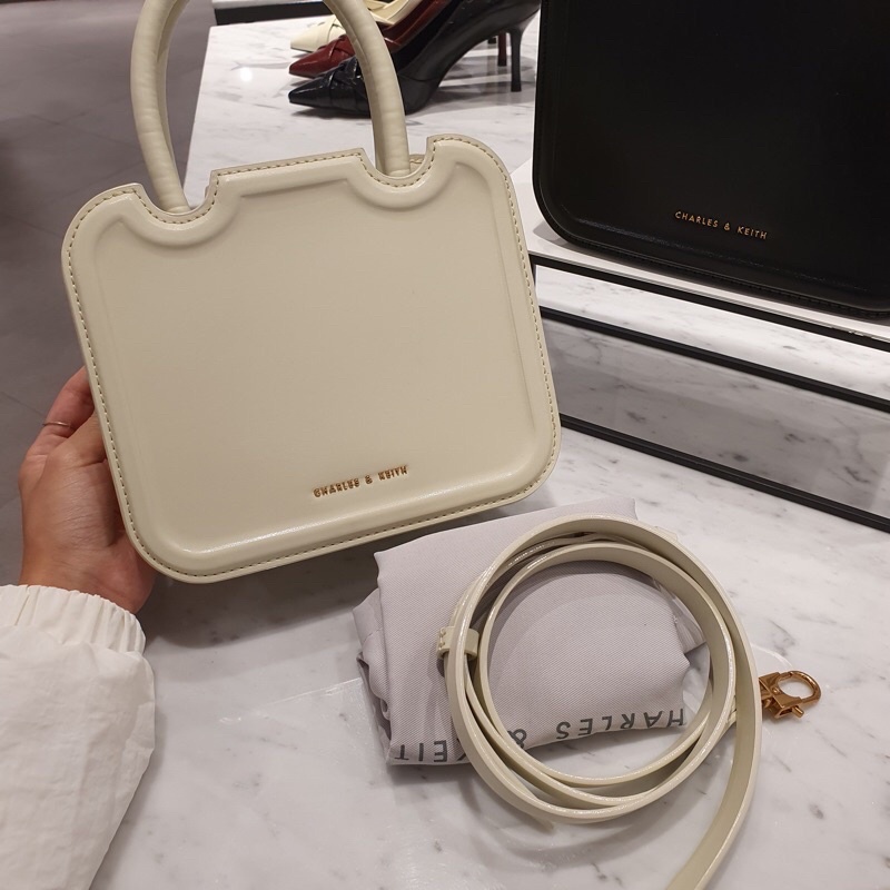 Túi cầm tay, đeo chéo CNK authentic