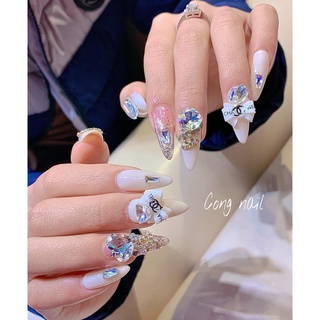 nơ bột đính móng tay trắng  - đen ( giá 1 cái)