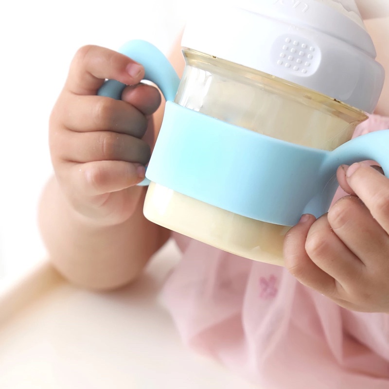 Quai cầm bình sữa cánh thiên thần silicon cho bé, ngậm nướu quai cầm silicone - Monnie Kids