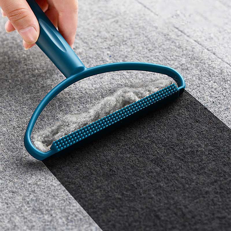 Dụng cụ loại bỏ lông xù trên bề mặt vải quần áo