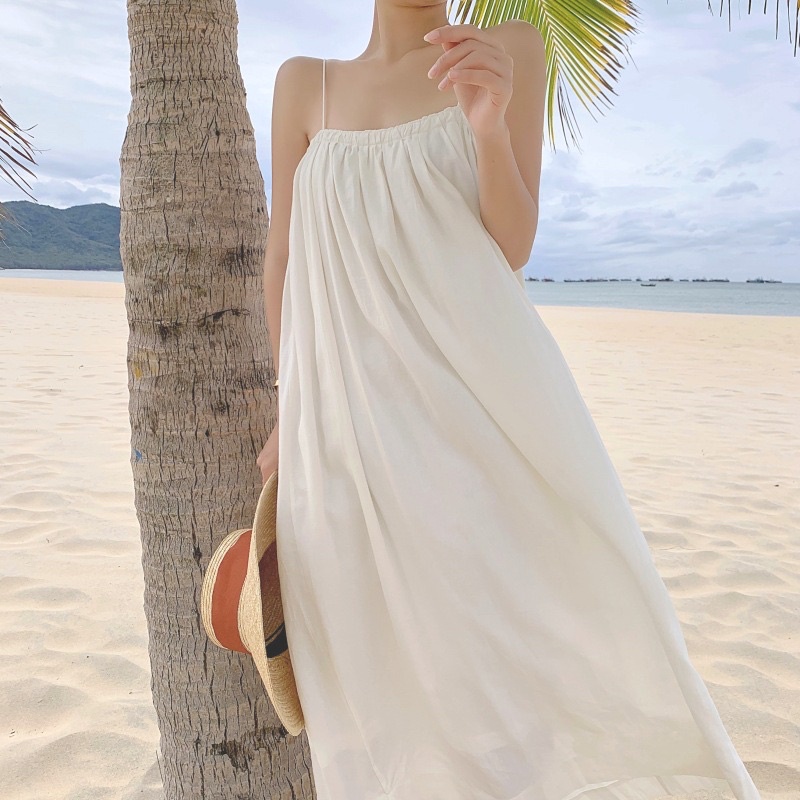 Đầm dây maxi trắng đi biển dáng xoè rộng rãi