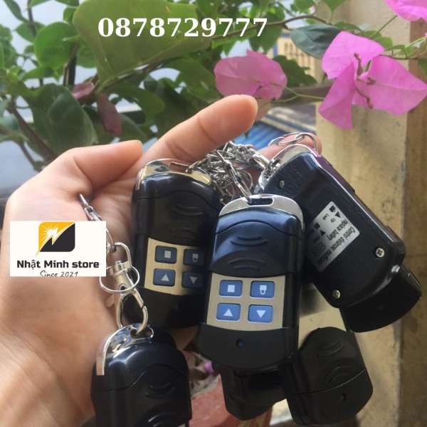 Điều khiển cửa cuốn hàng chính hãng mã gạt 433 MHZ  pin siêu bền