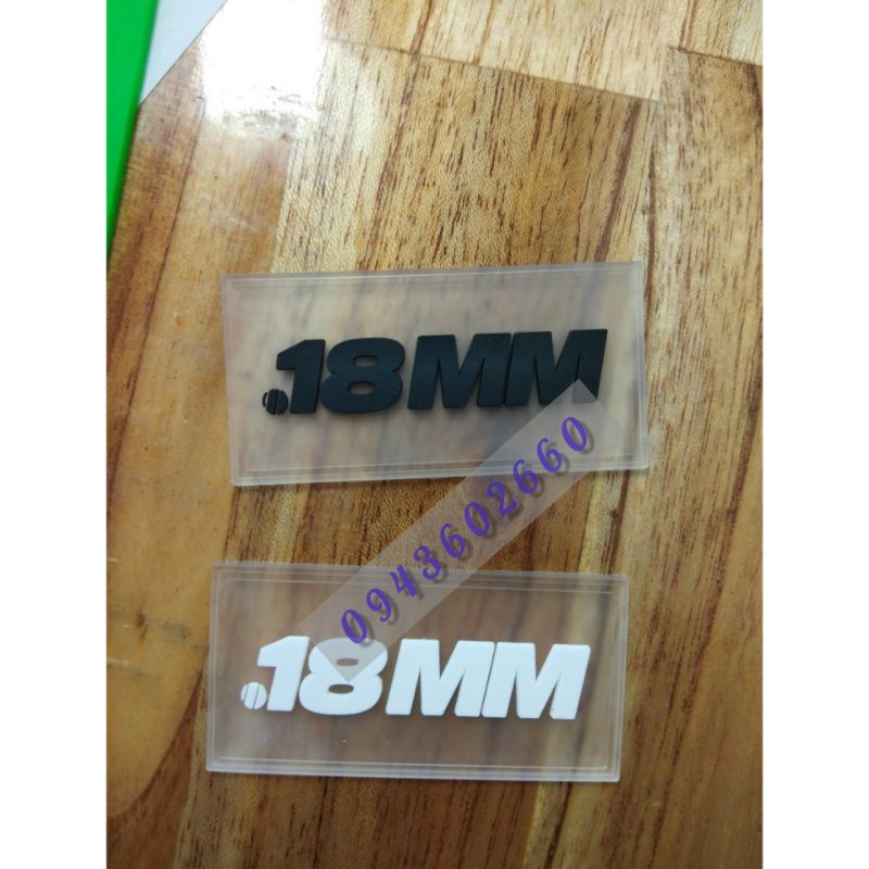 Ít nhất 500 cái). Tag nhựa dẻo, logo cao in theo yêu cầu may áo, balo, mũ nón