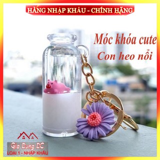 Móc khóa con heo trong bình sữa treo túi xách balo bình nhựa giả thủy tinh siêu bền