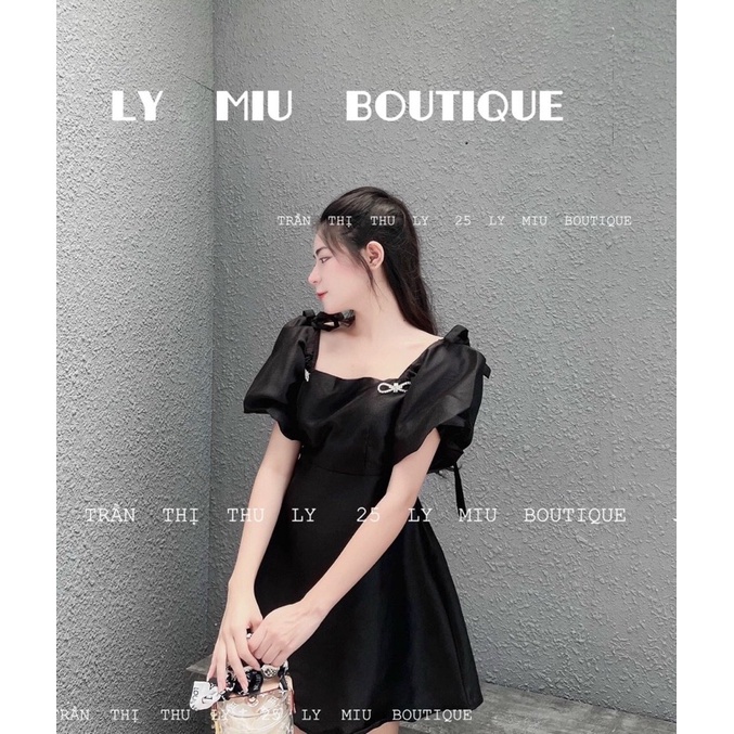 Đầm tiểu thư trễ vai đen đính nơ đá