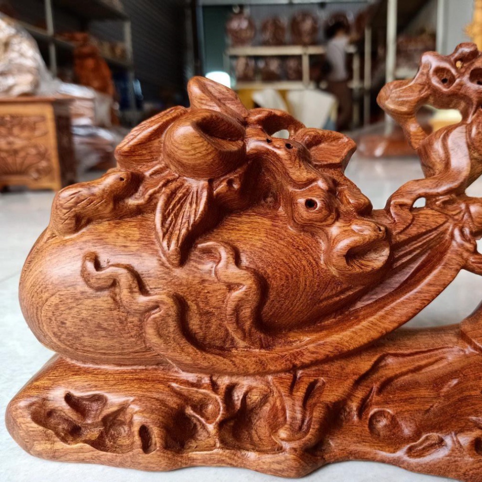 Tượng Phật Di Lặc Kéo Bao Tiền thu hút tài lộc Gỗ hương ngang 40cm
