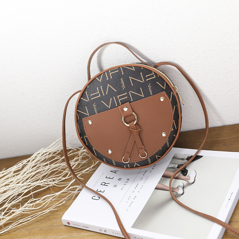 Túi đeo chéo dáng tròn nhỏ sành điệu cho nữ IELGY