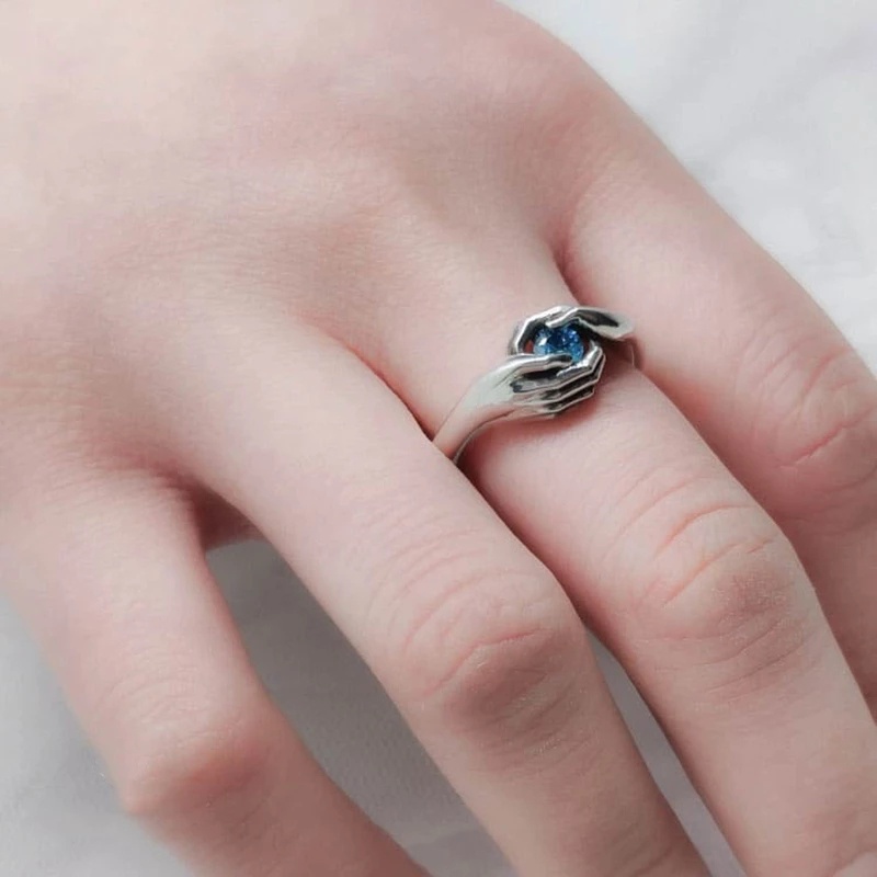 Nhẫn đính đá sapphire hình đôi tay đôi cánh thiên thần thời trang cho nam và nữ
