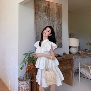 Đầm trắng cổ trụ tay tiên bèo tầng