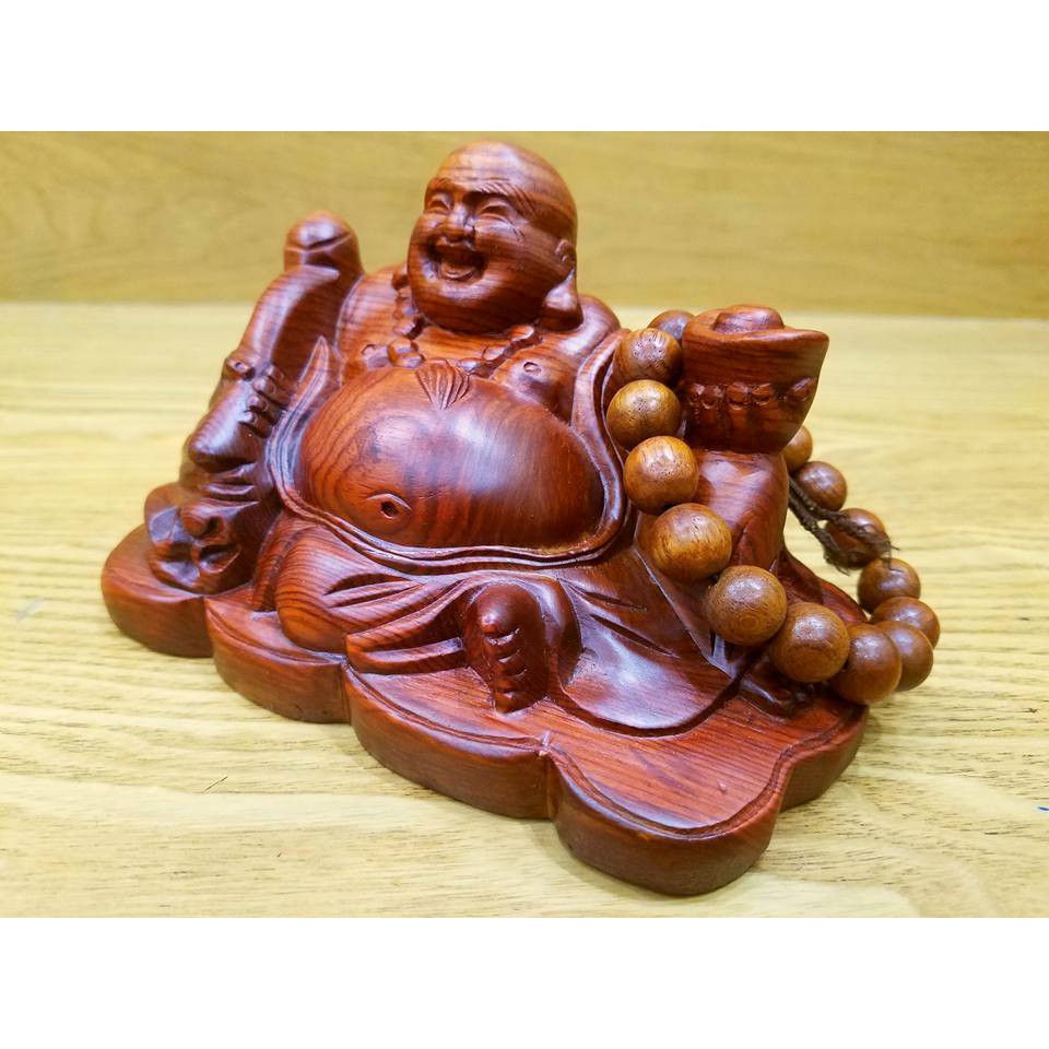Tượng phật di lặc để ô tô gỗ hương