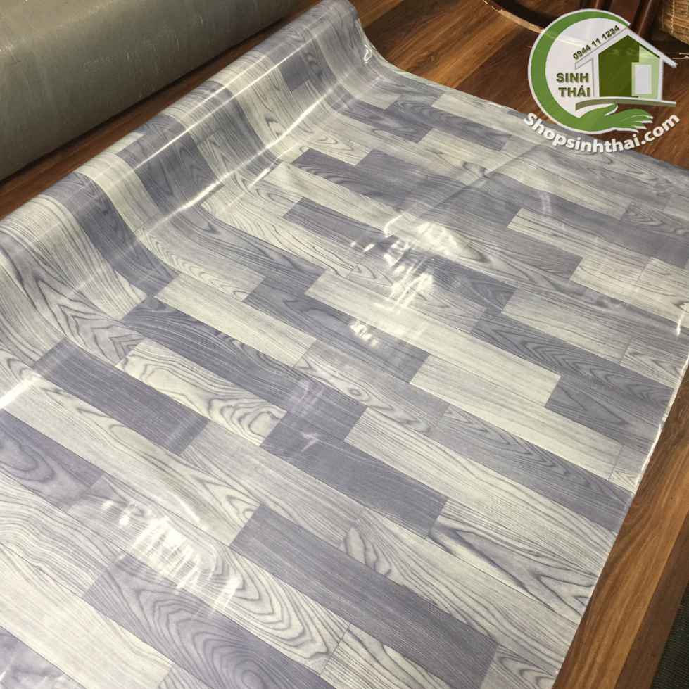 Thảm nhựa PVC simili trải sàn vân gỗ màu xám bóng