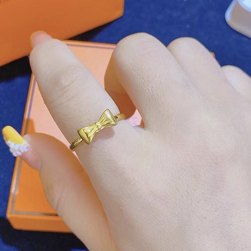 Nhẫn titan không gỉ mạ vàng 18k thiết kế hình chiếc nơ xinh xắn dễ thương dành cho nữ