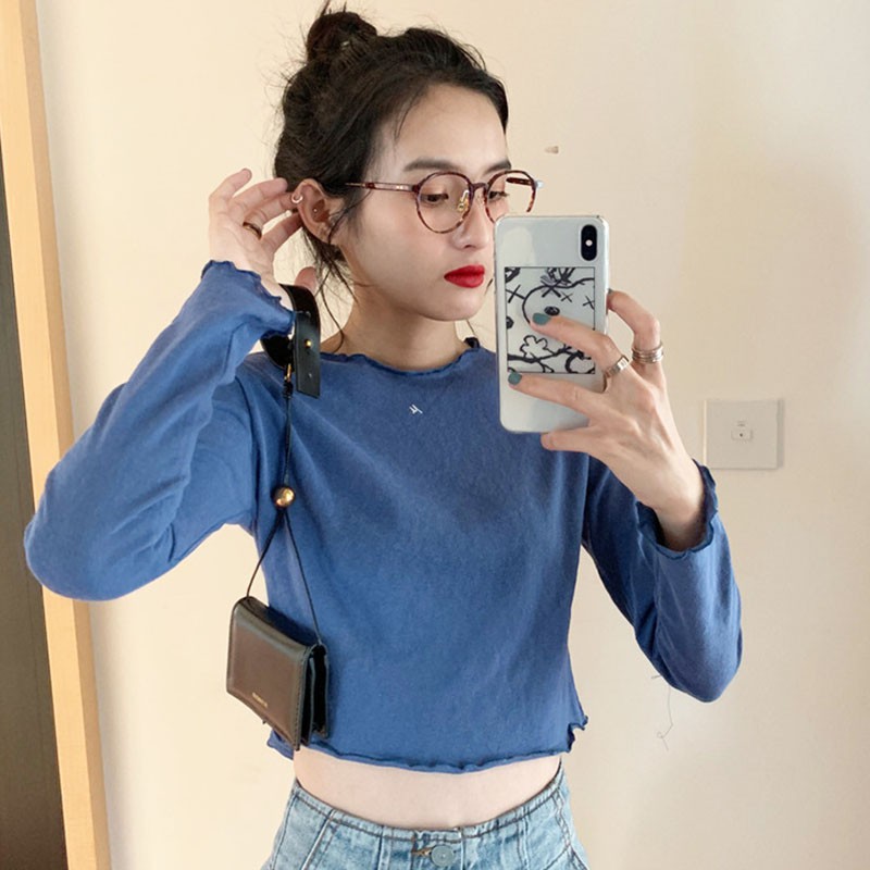 Áo sweater nữ tay dài dáng rộng màu trơn | BigBuy360 - bigbuy360.vn