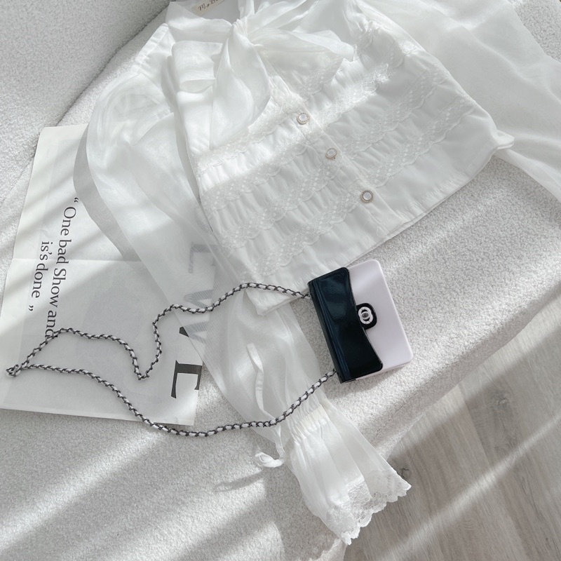 SET ÁO CROPTOP TRẮNG THẮT NƠ NGỰC + QUẦN SHORT ĐEN XẾP LY