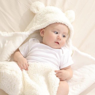 Đồ sơ sinh Ủ chân lông cừu cho bé