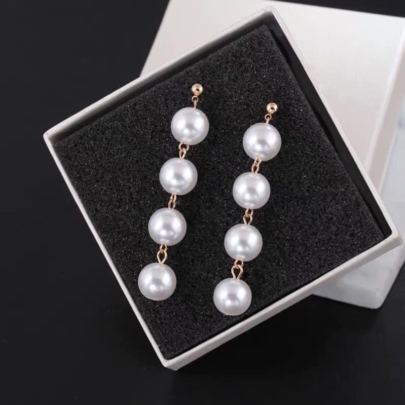 Bông tai Ngọc trắng dài 3 hạt đến 4 hạt..