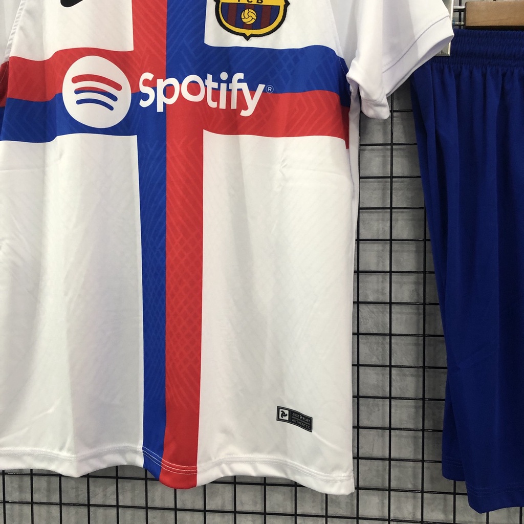 Bộ quần áo đá banh Barca trắng sân khách Jp logo C1 2023