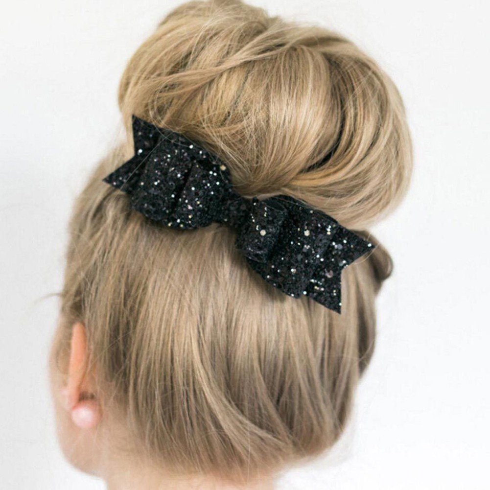 Cột nơ kim tuyến đáng yêu.