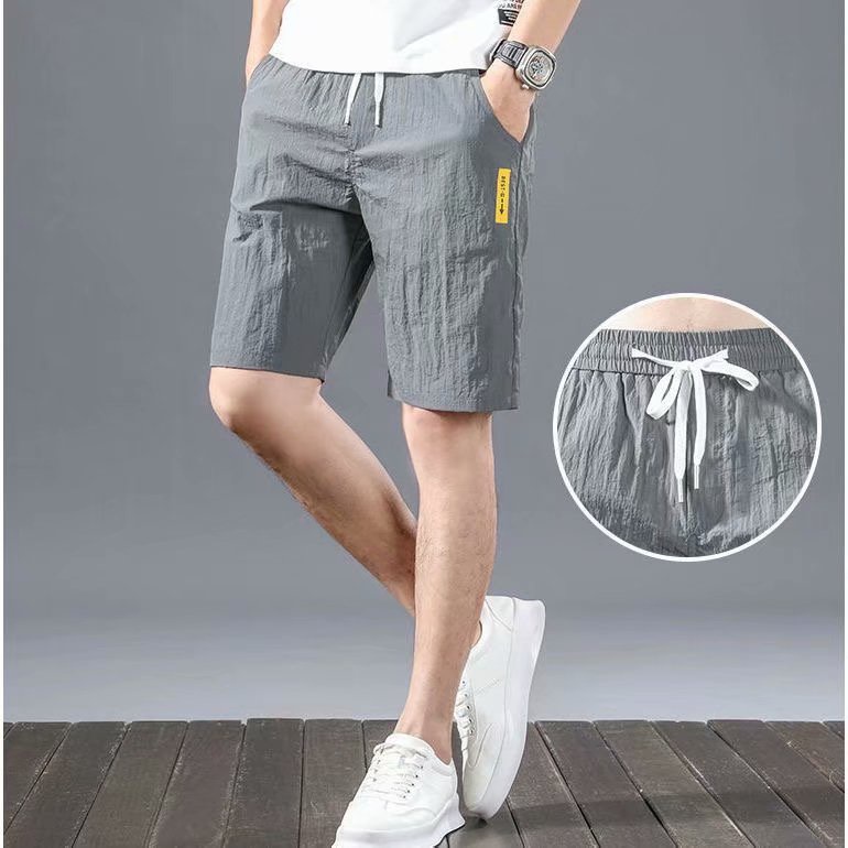 Quần Short Thể Thao Bằng Lụa Lạnh Siêu Mỏng Thoáng Khí Nhanh Khô Dáng Rộng Thời Trang Mùa Hè Cho Nam