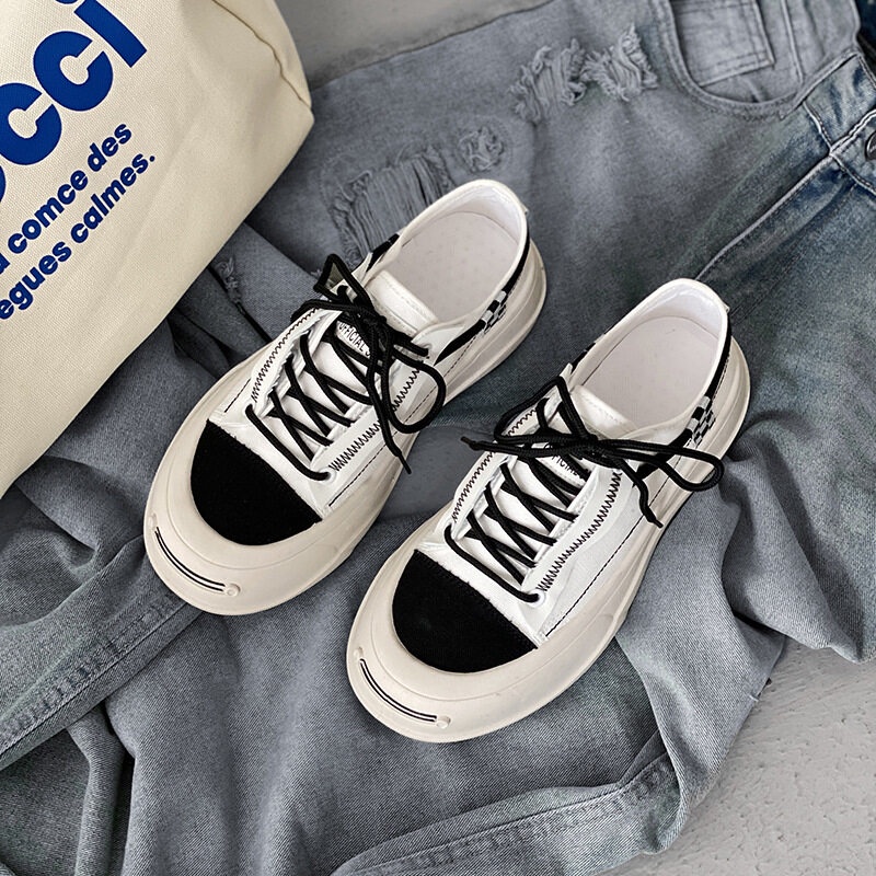 Giày thể thao QIAOYILUO đế mềm bằng vải canvas thoáng khí cho nam