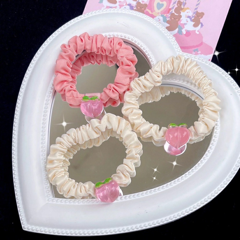 Cột Tóc Vải Nhún Đính Charm Phô Mai Đào Sanrio Pastel