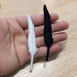 1 miếng dán ủi quần áo hình lông vũ trắng đen 8.5 * 1.5cm