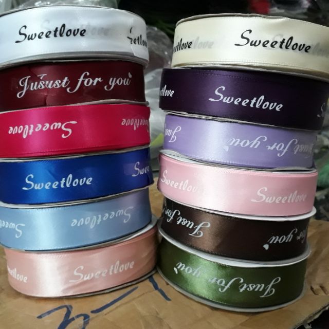 1 cuộn ruybang lụa in chữ2,5 cm