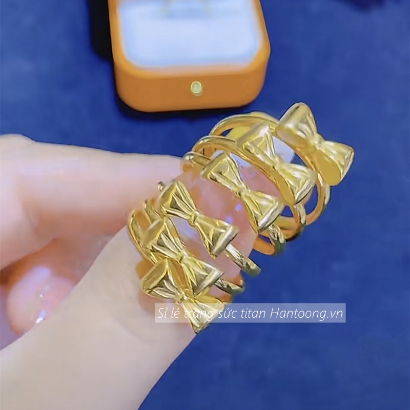 Nhẫn titan không gỉ mạ vàng 18k thiết kế hình chiếc nơ xinh xắn dễ thương dành cho nữ