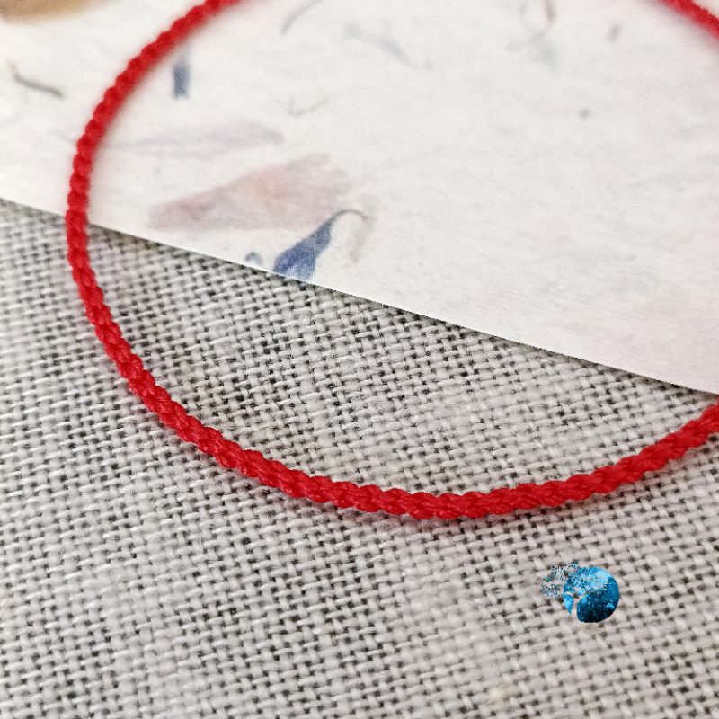 Vòng tay tết dây chỉ đỏ may mắn