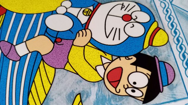 Hình ủi nhiệt Nobita doremon  cỡi cá chép.kt 12.5* 11.5