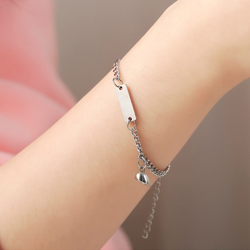 Set 2 Vòng Tay Mặt Hình Trái Tim Bằng Thép Titan Có Nam Châm Cho Cặp Đôi