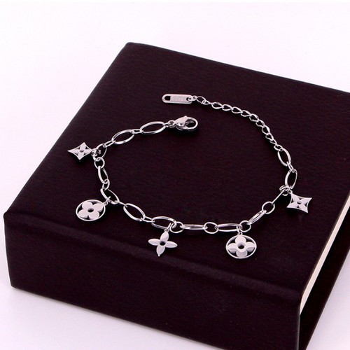 Lắc Tay Hoa Văn Titan Ko Đen TT 3237